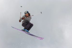 Luke Koppa doing a jump on skis