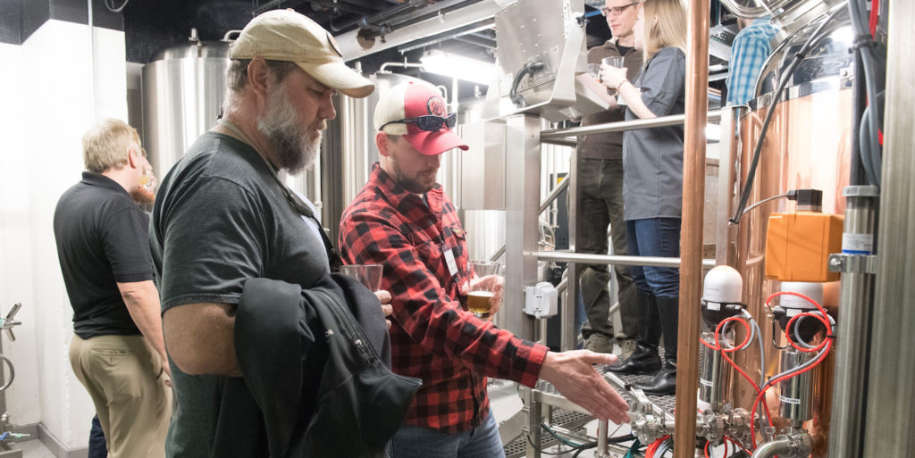 Visitors inspect new brewery