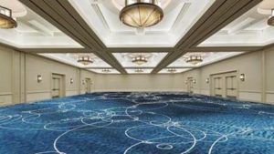 Hahn's ocean-blue carpet design with various patterns, made for the hospitality industry. 