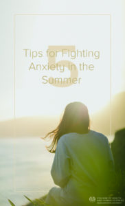 Woman by lake-shore. 5 tips for fighting anxiety in the summer.