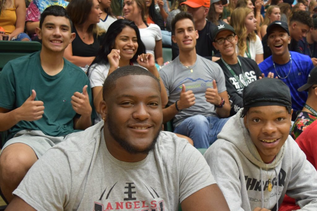 Freshman smile as they sit in Moby arena, waiting for the Ram Welcome Day to begin.