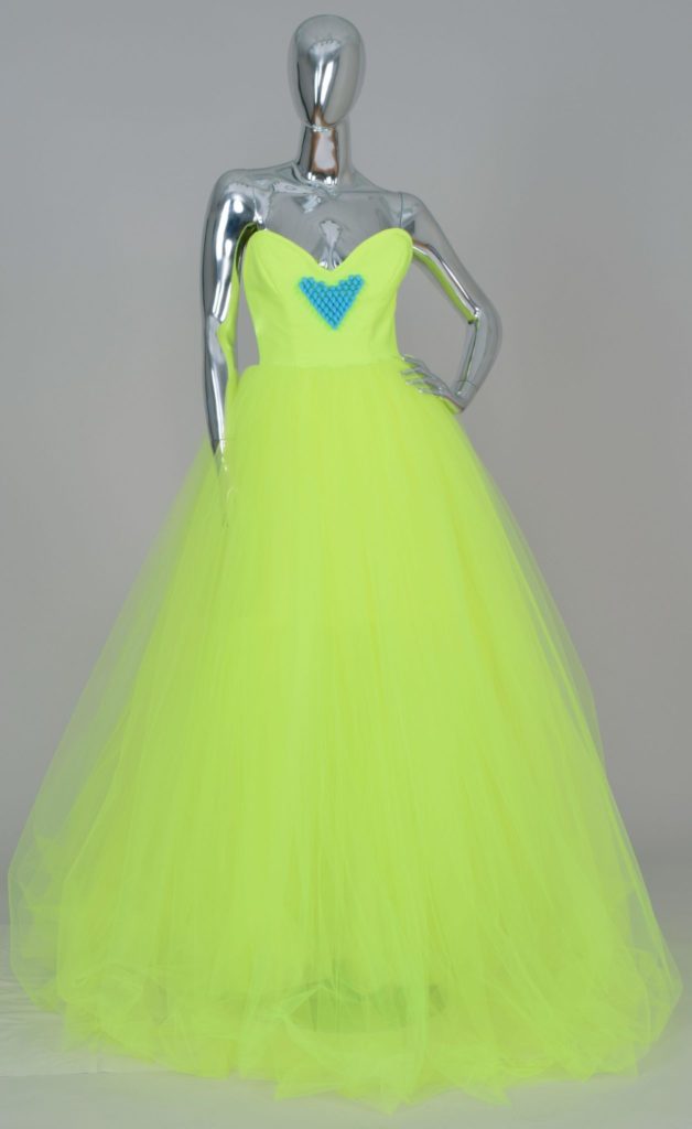 This ethereal, bright lime colored gown has a three dimensional heart design decorating the bodice, which lights up when exposed to sounds.