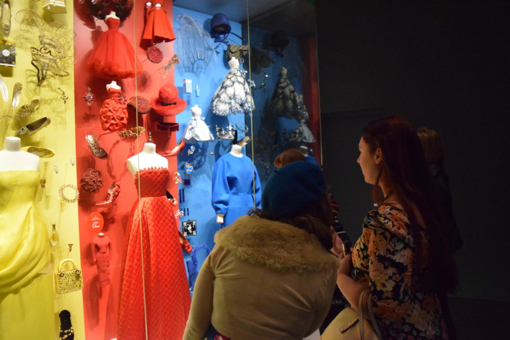 Guests appreciate the color coordinated Dior display.