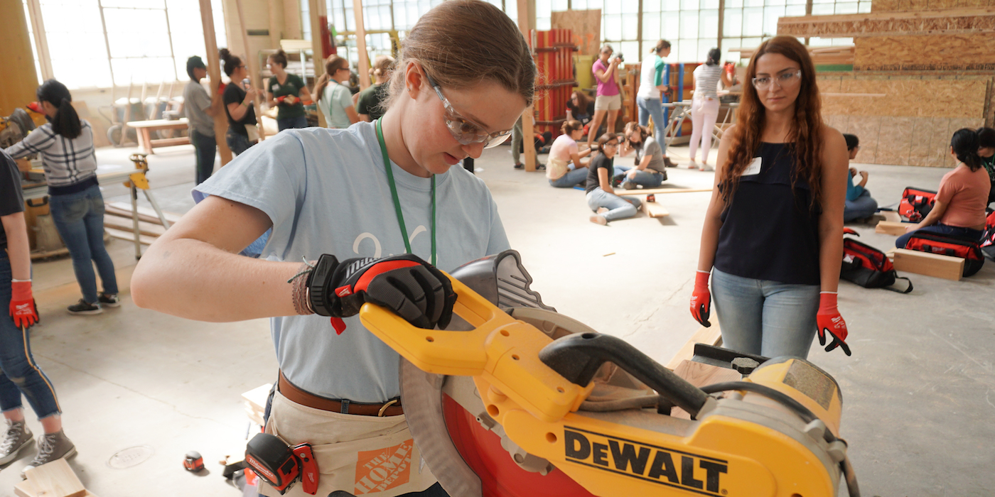 Participant using a saw