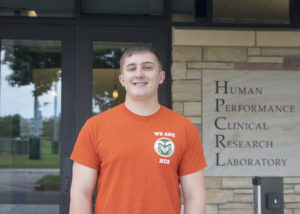 Ewell outside of CSU’s Human Performance Clinical Research Laboratory which houses the Integrative Biology Lab where he works.