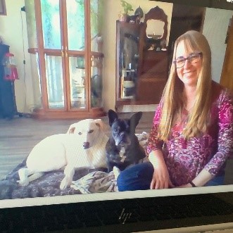 therapy dog team during a virtual visit with school students