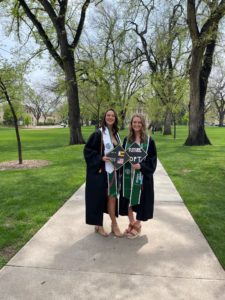 Savannah Ager and her roommate Megan Martin graduating on the Oval in Spring 2021