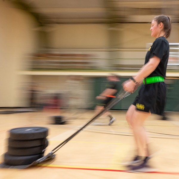 An ROTC student pulling weights