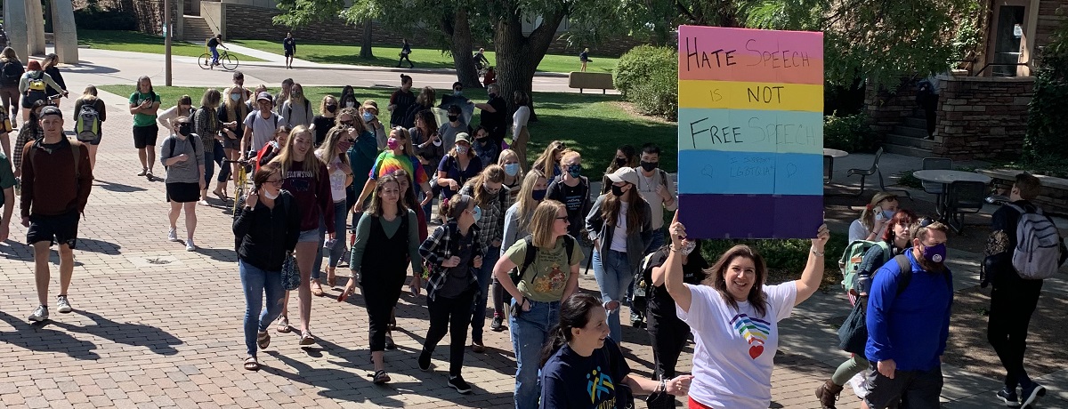 colorado state university school of social work students, staff, and faculty marching in support of lgbtqia rights