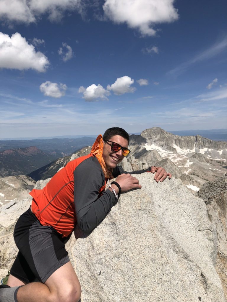 Travis Amato on top of Mount Snow Mass 