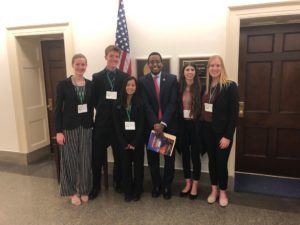 Manning, other Schools for Climate Action students, and local representative, Joe Neguse.