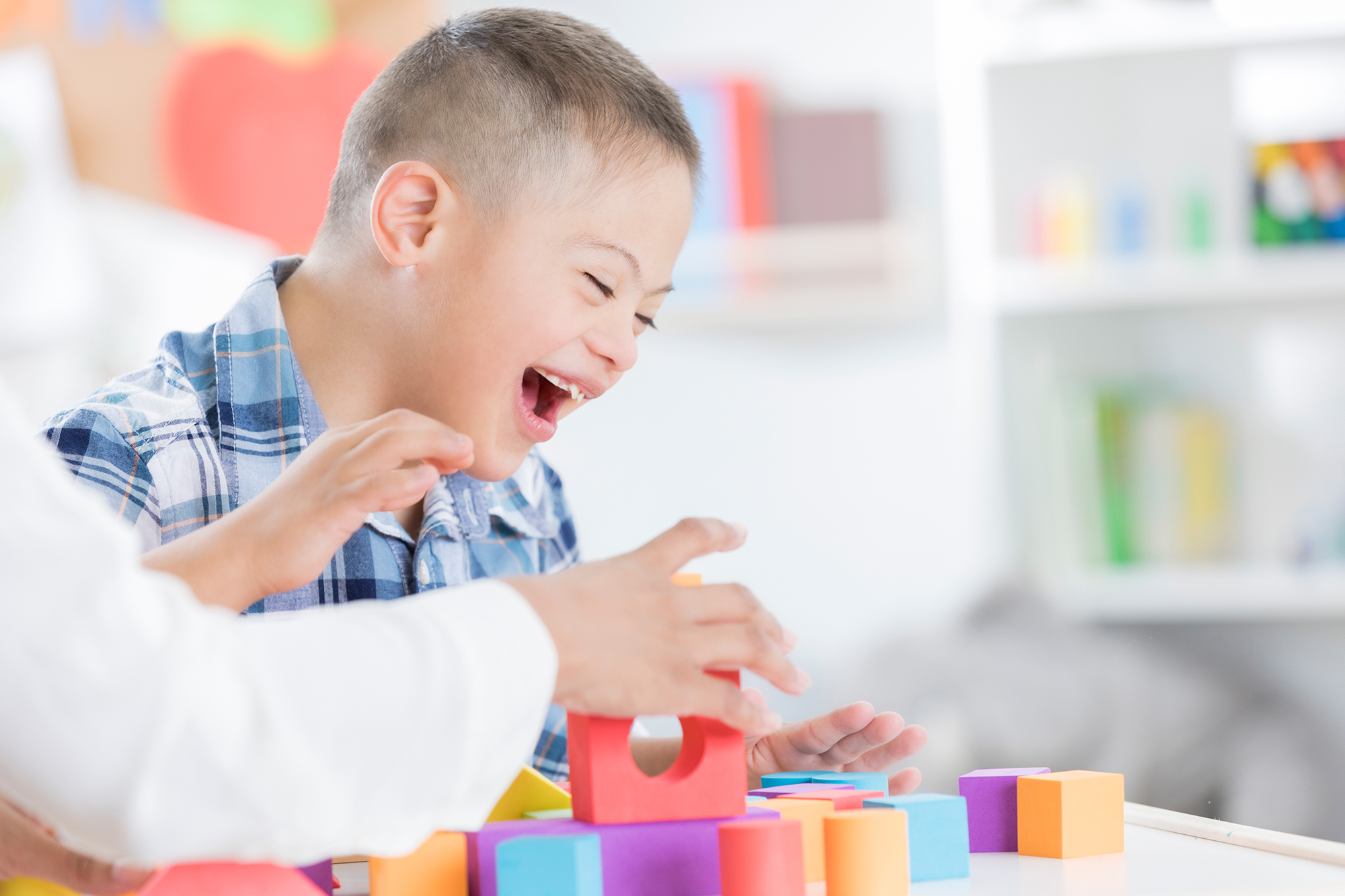 DD Lab image of child playing with blocks