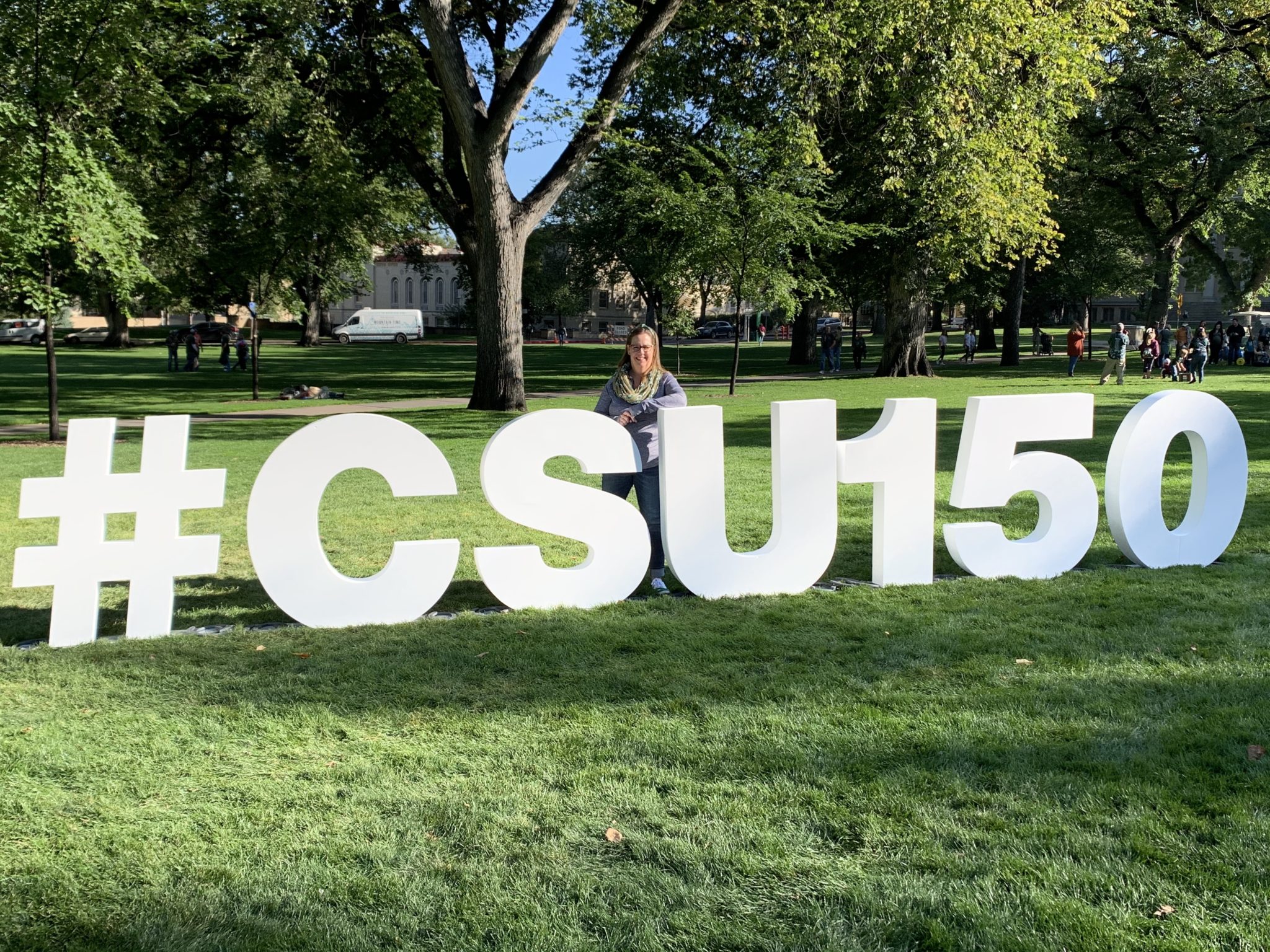 Donor Steph Hardon In Front Of CSU 150 Sign