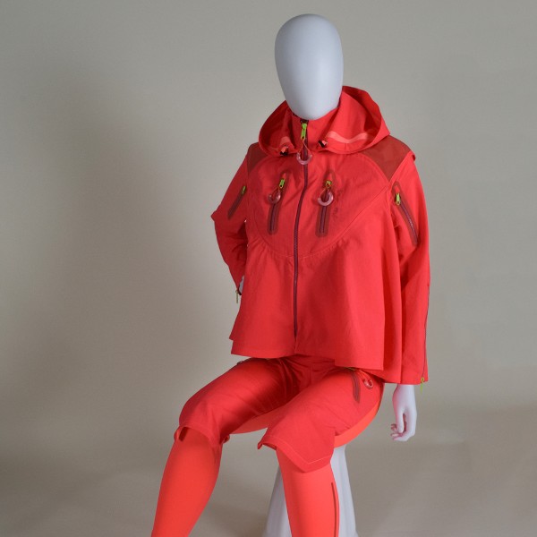 Image of a bright red rain suit on a mannequin