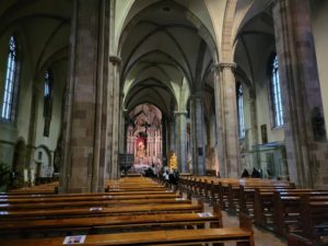 Study abroad students inside the massive Bolzano, Italy cathedral