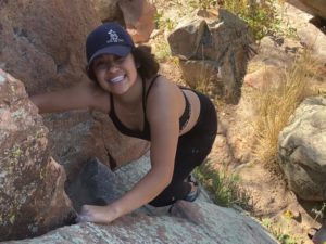 Erin Dominguez rock climbing