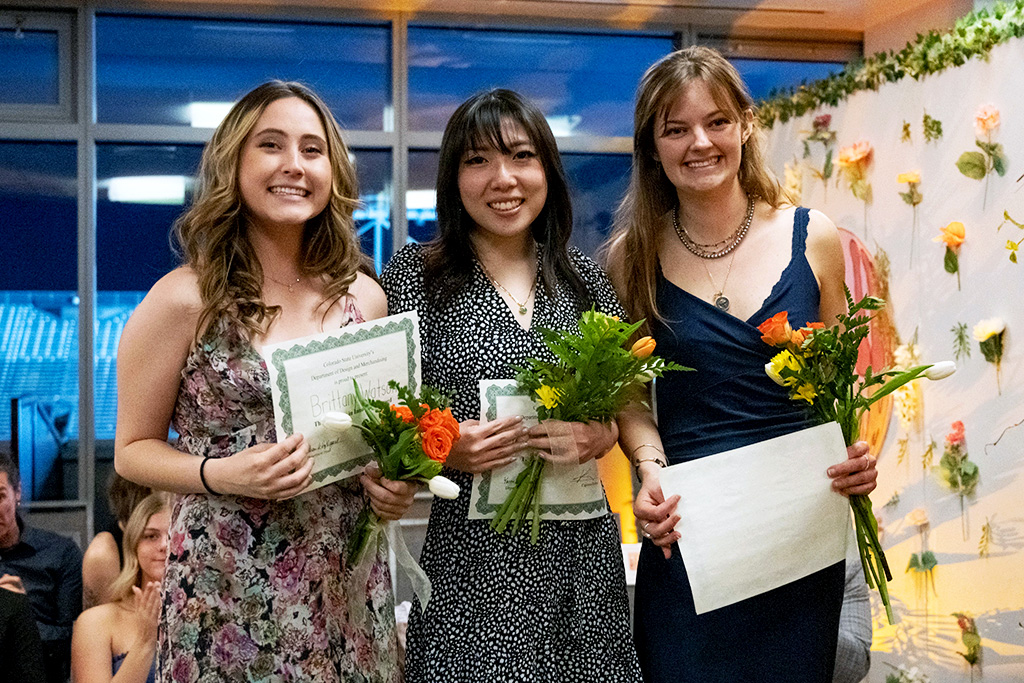 Award winning designers Brittany Watson, Krista Melusky, and Elise Hadjis at the “All in Bloom” fashion show, showcasing work from senior Design and Merchandising students at Colorado State University. May 6, 2022