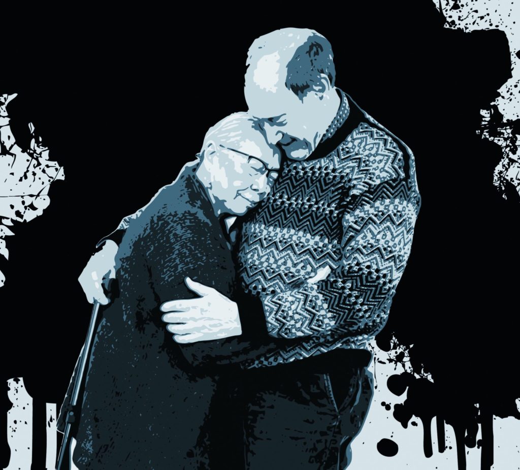 older adult couple hugging