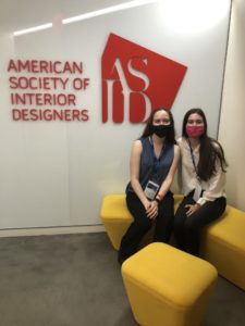 Sara Bovaird and a friend in front of the ASID sign