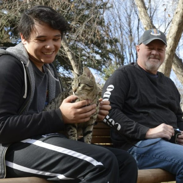 Kiko and owner Brian Chavet working as a HABIC team at a recent de-stress event for Colorado State University students.