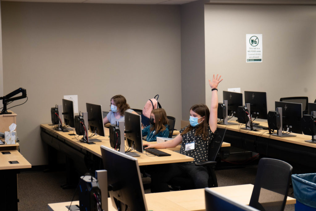 Students in the computer lab learn digital design.