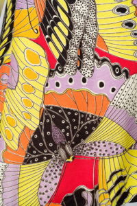 Colorful butterflies adorn this dress detail