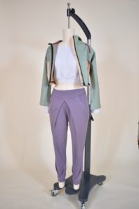 full length image of the jacket, cropped top, and leggings with a folded pattern designed by Elise Hadjis.