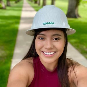 Ivannia Conejo walking on The Oval with a hard hat on