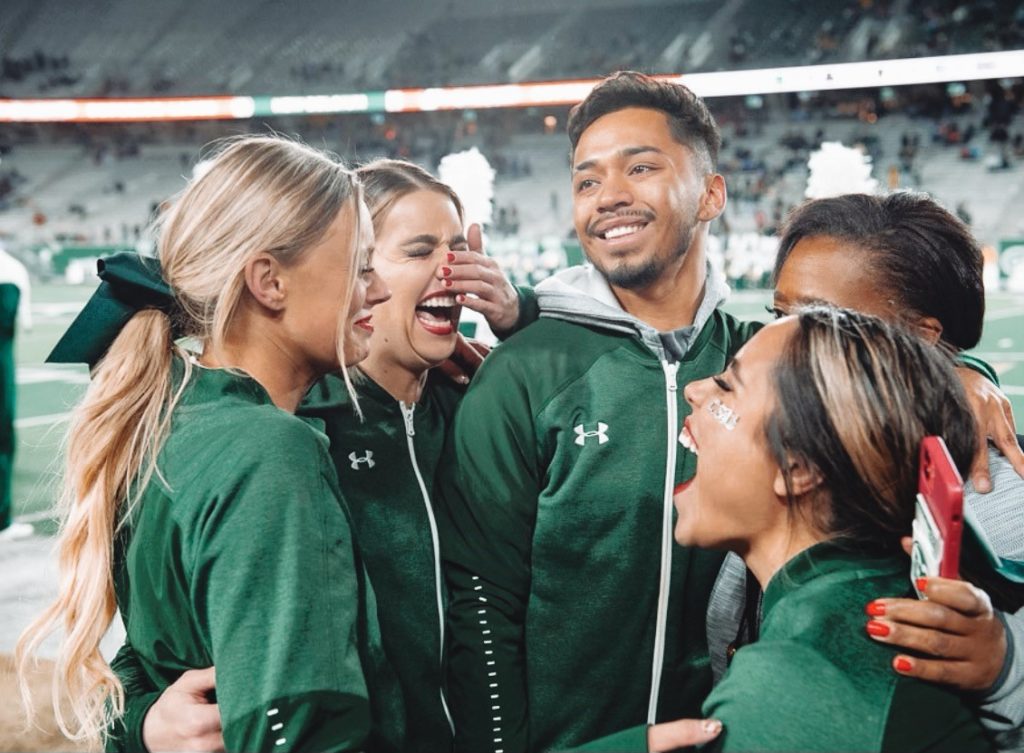 Kaiya Jenkins and a group of cheerleading teammates.