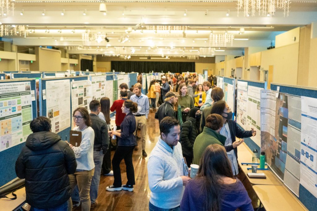 Students present their research posters at the 2022 Grad Show in CSU's Lory Student Center Ballroom.