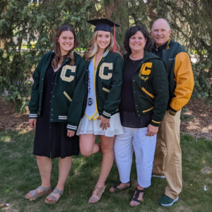 Kelcy Blaho and her family pose outside of a CSU building, all wearing CSU letter jackets, for her sister's graduation.