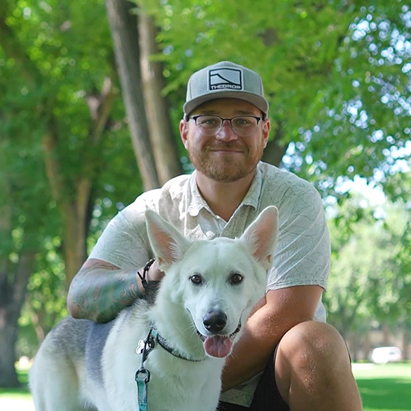 Seth profile photo with a dog