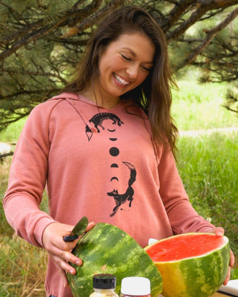 Lacey Eadon smiles at a watermelon.