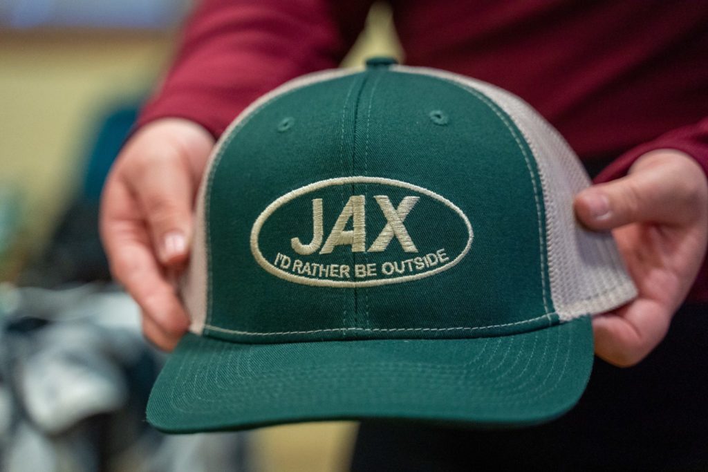 A cap that says "JAX-I'd rather be outside"