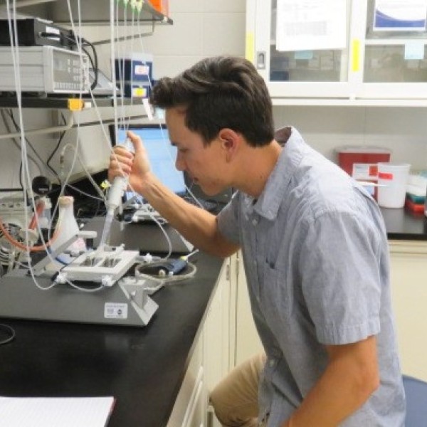 Dustin Lee in a lab