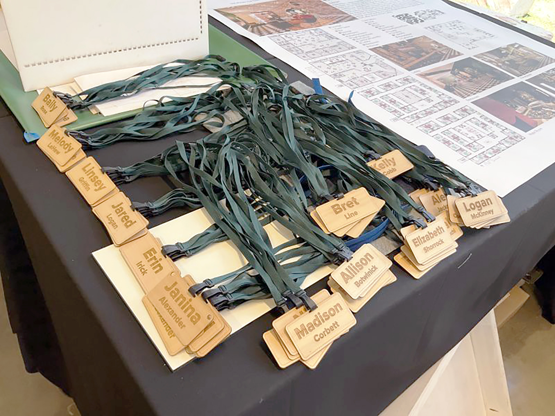 Laser-cut nametags used by CSU faculty member Sonali Diddi during a 2023 symposium.