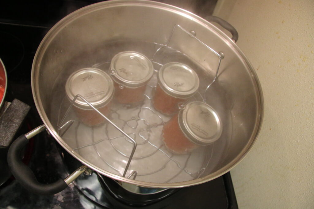 Jars in a pan of hot water