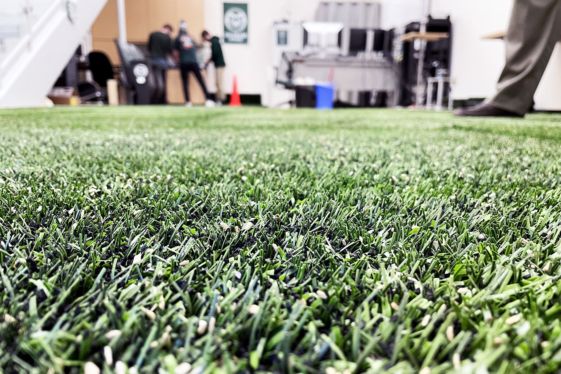 A close-up, foot-level view of artificial turf in Raoul Reier's lab at CSU.