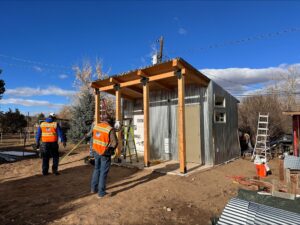 Exterior corrugated aluminum siding being added to the Wiley Acres restroom facility