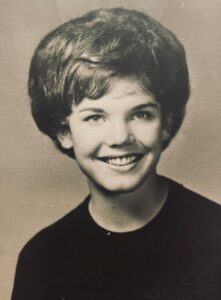 Black and white portrait of a sorority member in the 1960s