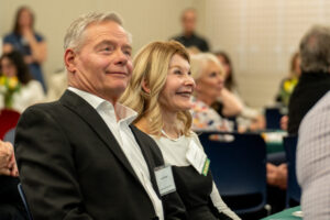 Jodie and her husband, Louis smile at the Legacies and leaders event.