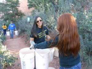 Acuff volunteering with the Mortar Board at the Garden of Gods trail clean-up event.